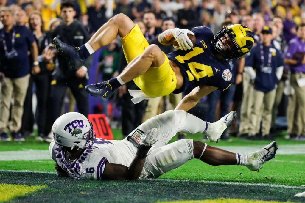 Snap counts, PFF grades: Roman Wilson leads Michigan offense with  incredible TD grab 